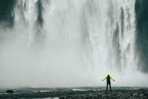 Person by waterfall